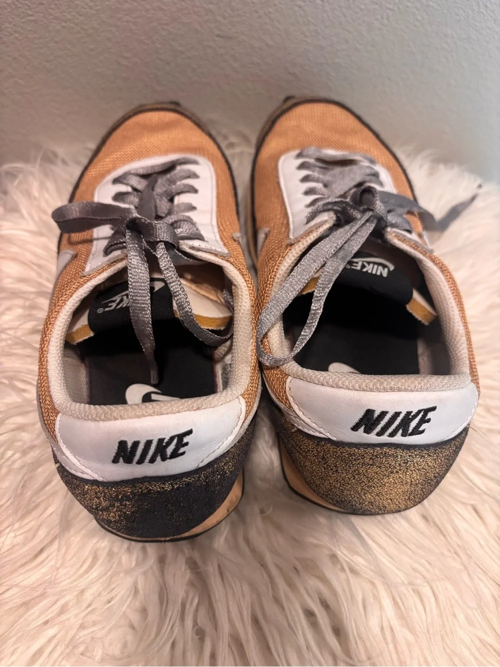 Nike Women’s Metallic Gold Mesh Sneakers